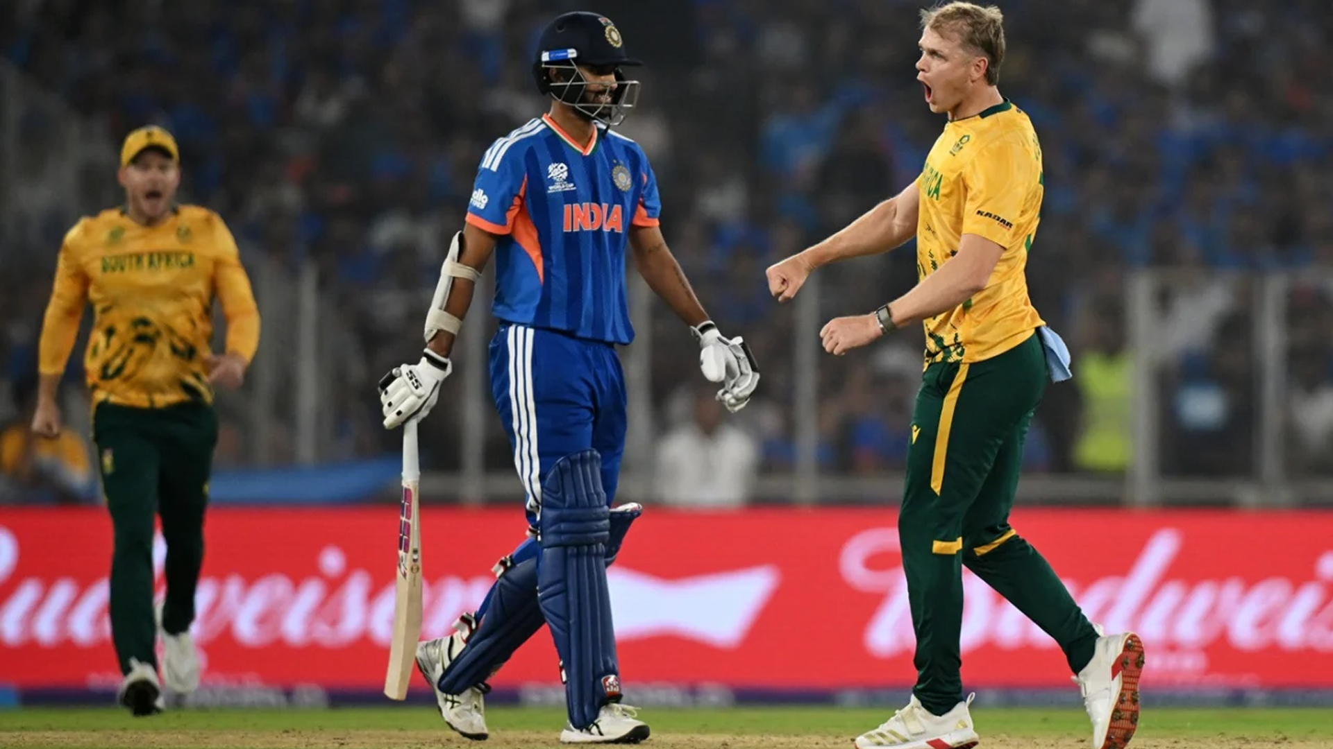 Indian cricket team players walking off the field after a heavy defeat against South Africa in the T20 World Cup Super Eight match in Ahmedabad.
